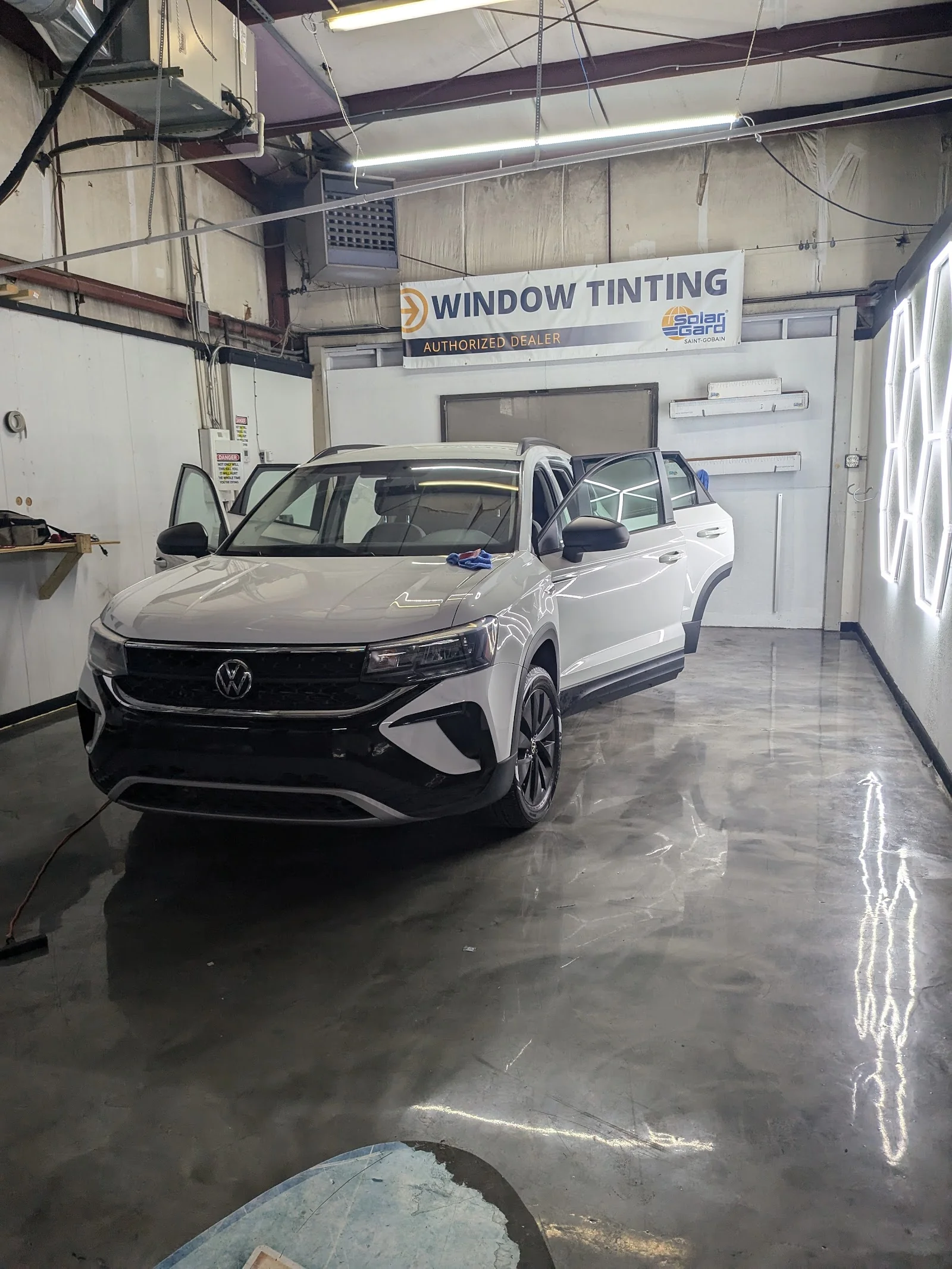 Inside Mobile Audio & Tint Solutions — shop interior and install bay